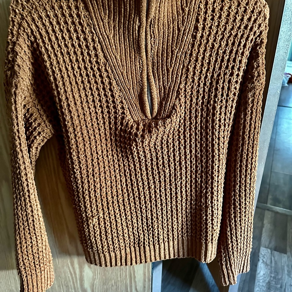 Looks more brown in person
